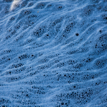 Foam in creek during runoff, Yosemite Valley.