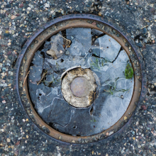 Water frozen in floor drain, Bozeman.