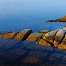 Granite outcrop at dawn ebb tide, Nova Scotia.
