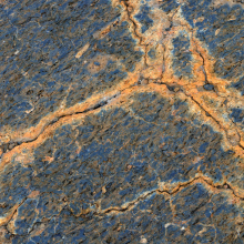 Iron staining in lava cracks, the beginnings of soil.