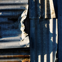 Morning sun on orrugated steel, Ag Depot, Bozeman.